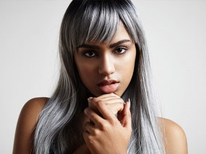 young woman with grey hair tint